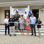 Nally Homes team members at ribbon cutting event.
