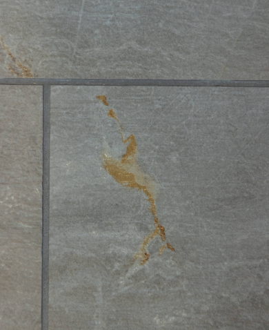 Beautifully stained bathroom tile designed by Nally Homes.